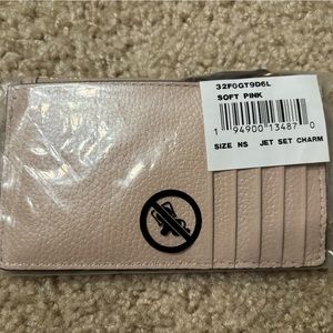 Michael Kors jet set soft pink charm wallet coin